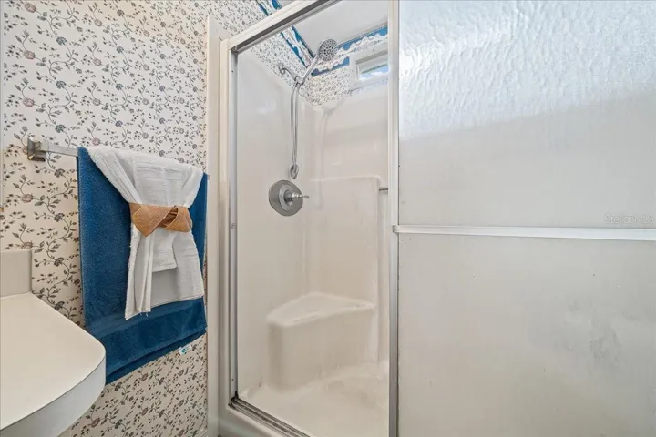 Primary Bathroom Features a Walk-in Shower