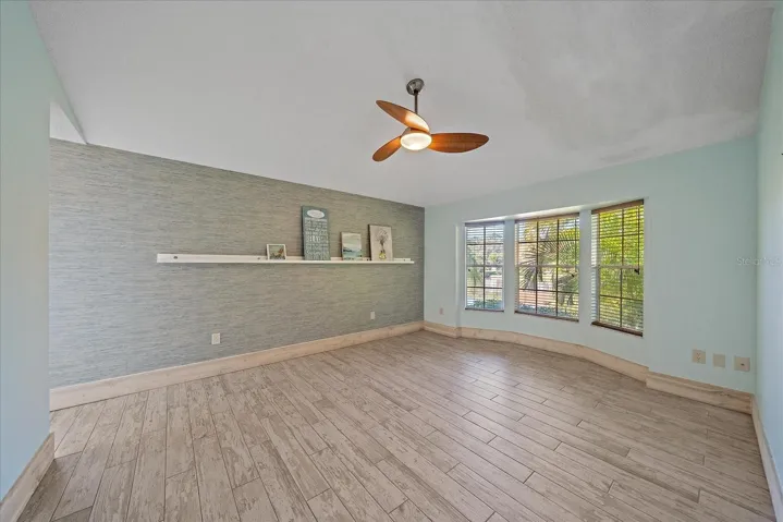 Primary bedroom with LVP flooring
