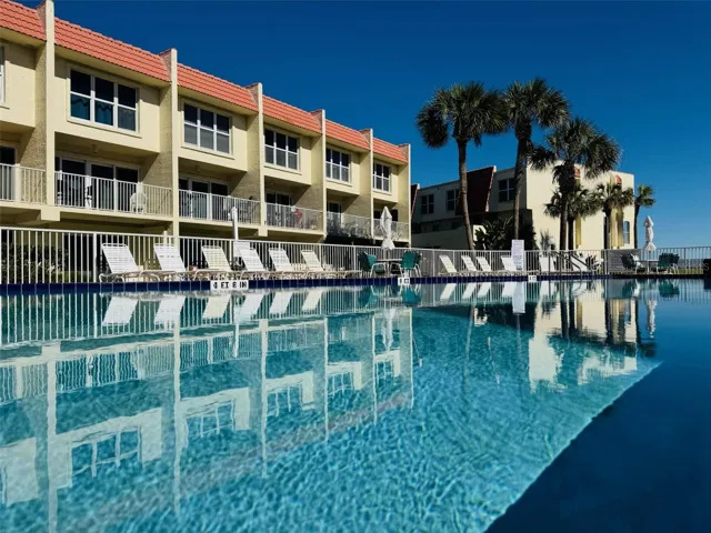 Resort style heated pool with Beach Views