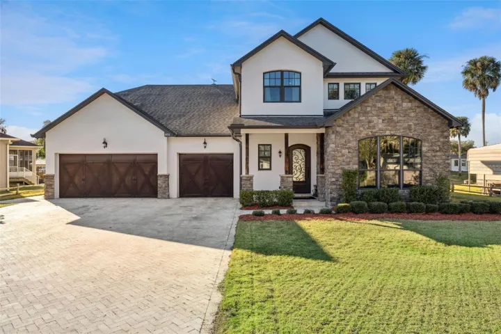 In the perfect location, on an oversized lot, set on a private DEEP-WATER CANAL in the sought-after Palm Shadows community, this exceptional CUSTOM BUILT ESTATE redefines WATERFRONT LIVING with uncompromising craftsmanship, thoughtful design, and DIRECT ACCESS TO THE ST. JOHNS RIVER – all with NO HOA!