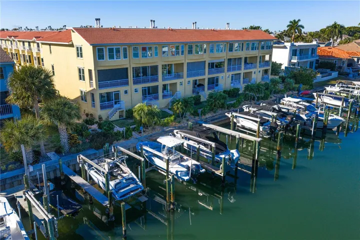 Waterfront Back of building with personal oversized boat slip