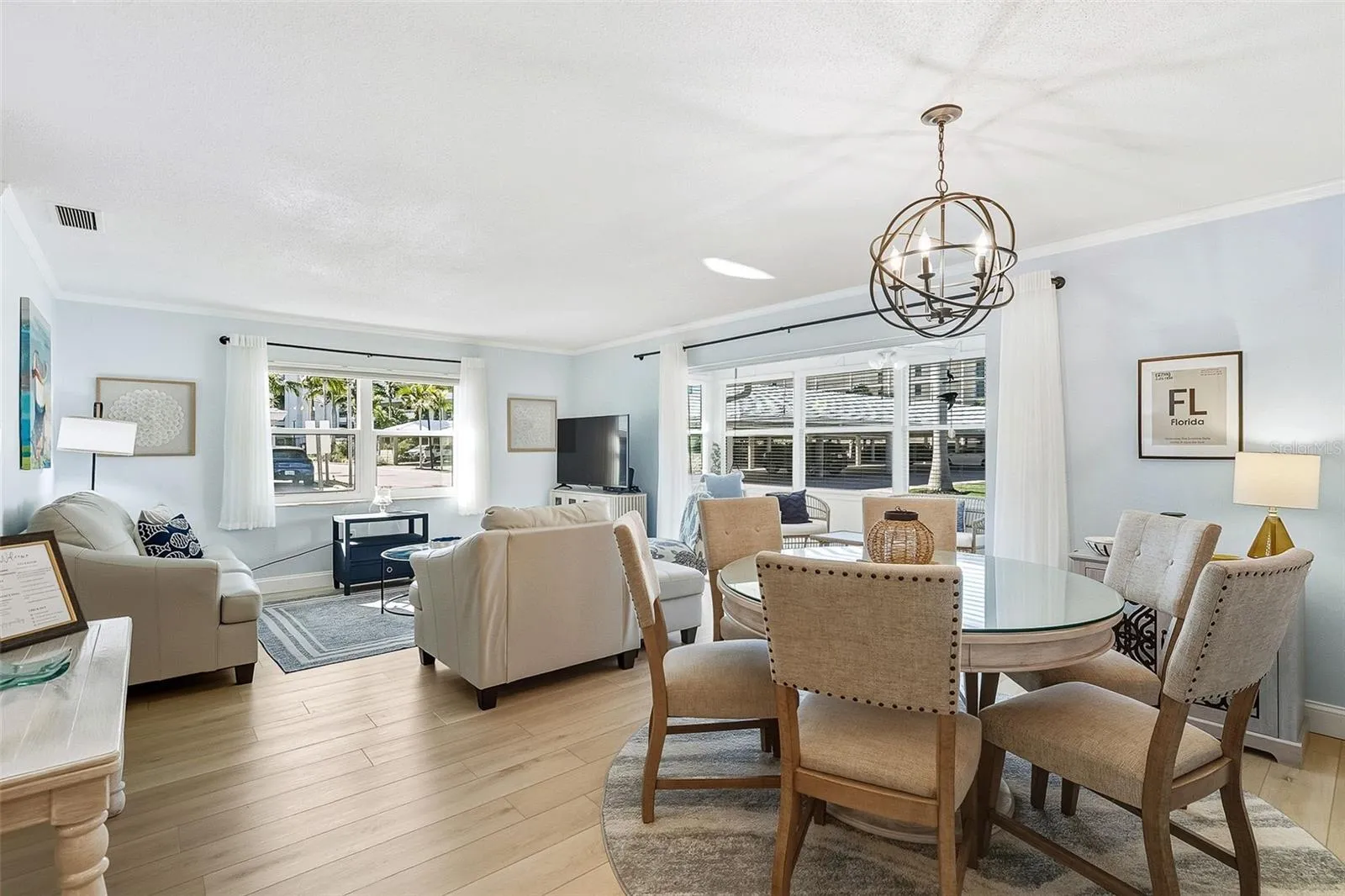 Open plan dining/living area with a coastal feel.