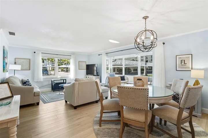 Open plan dining/living area with a coastal feel.