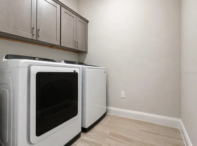 Laundry Room with Washer &amp; Dryer Already Installed