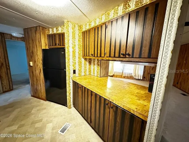 Kitchen looking into Living Area