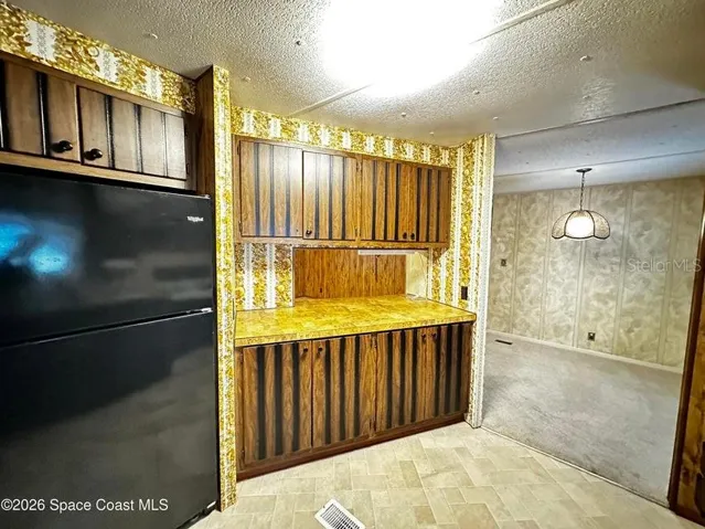 Kitchen looking into Living Area