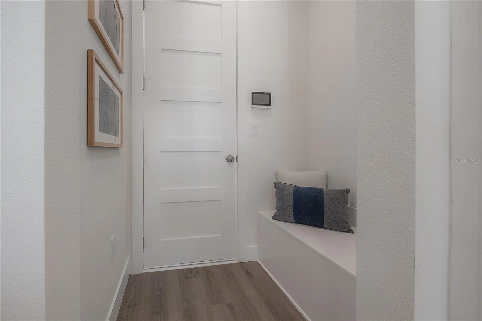Entry vestibule just off the spacious one-car garage