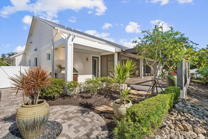 Side garden area adjacent to built-in grill