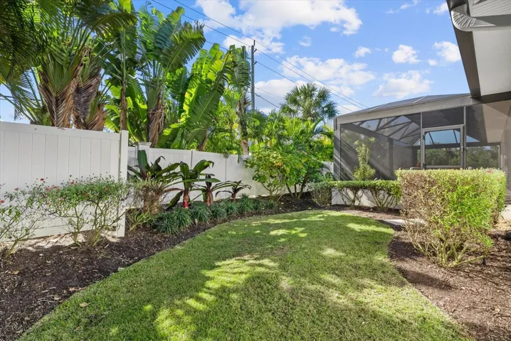 Green space on left side of home