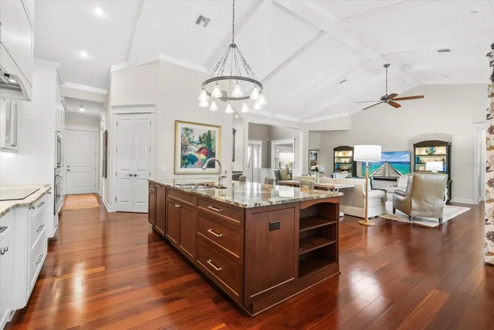 Kitchen into Living Room, Hallway for Guest Bedroom #2, Garage, and Laundry