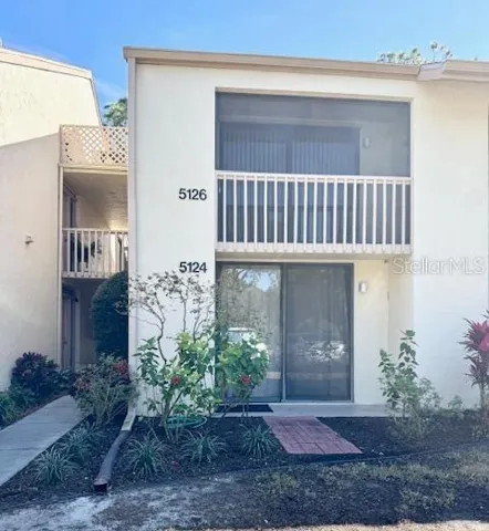Front of Condominium Bottom Unit