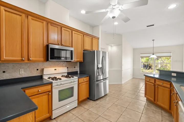 Kitchen with solid wood cabinetry and ample storage