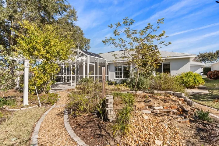 Spacious screened lanai overlooking garden