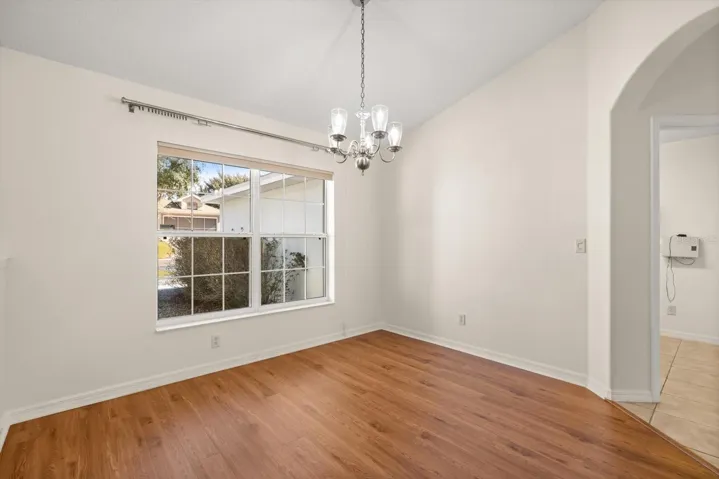 Dining area adjacent to kitchen and living spaces