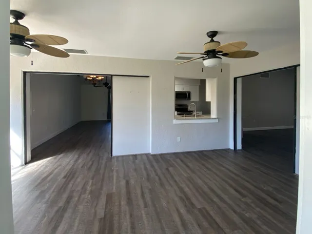 Florida room with pass through window from kitchen