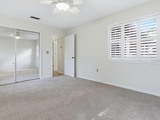 Bedroom 3 mirrored closet Plantation shutters