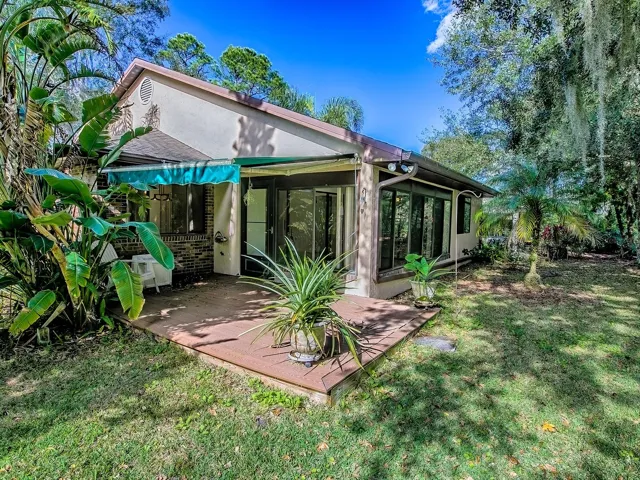 Awning covered patio off of Florida room