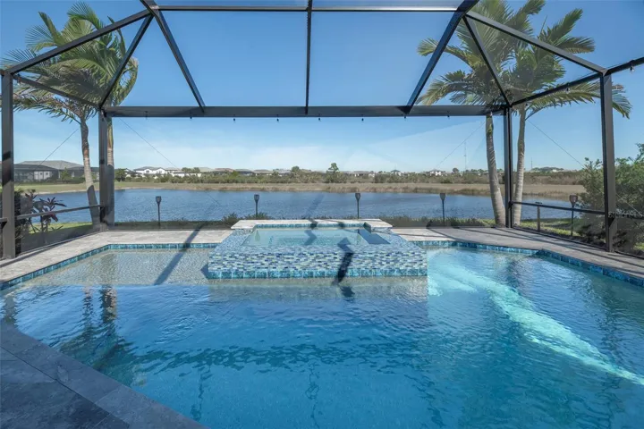 Pool with a lake view.