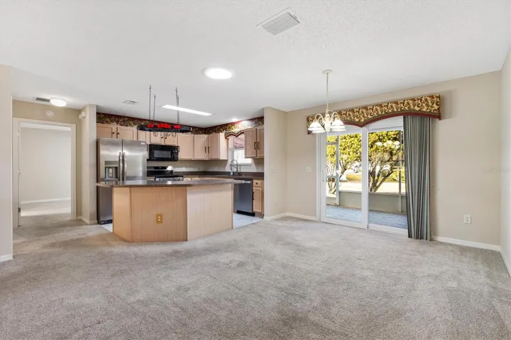Looking into Dining Room and Kitchen