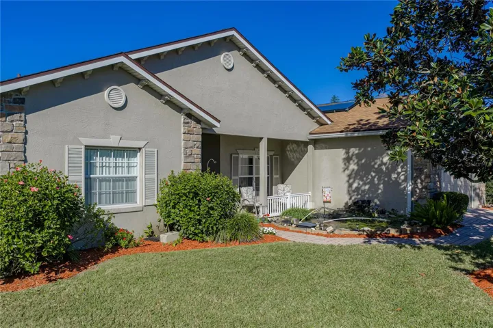 The soffit has special architectural features, and the faux shutters help to enhance this home's beauty.