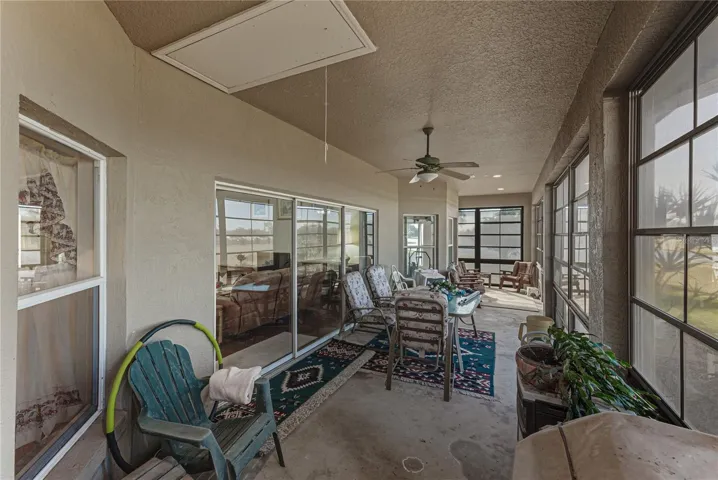 The attic is accessible through the pull-down ladder in the lanai.