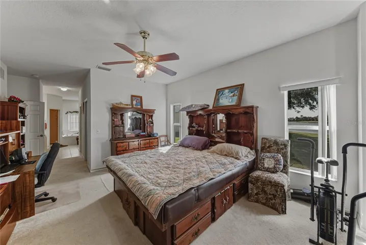 The primary suite fills the entire south wing of this split floor plan home.