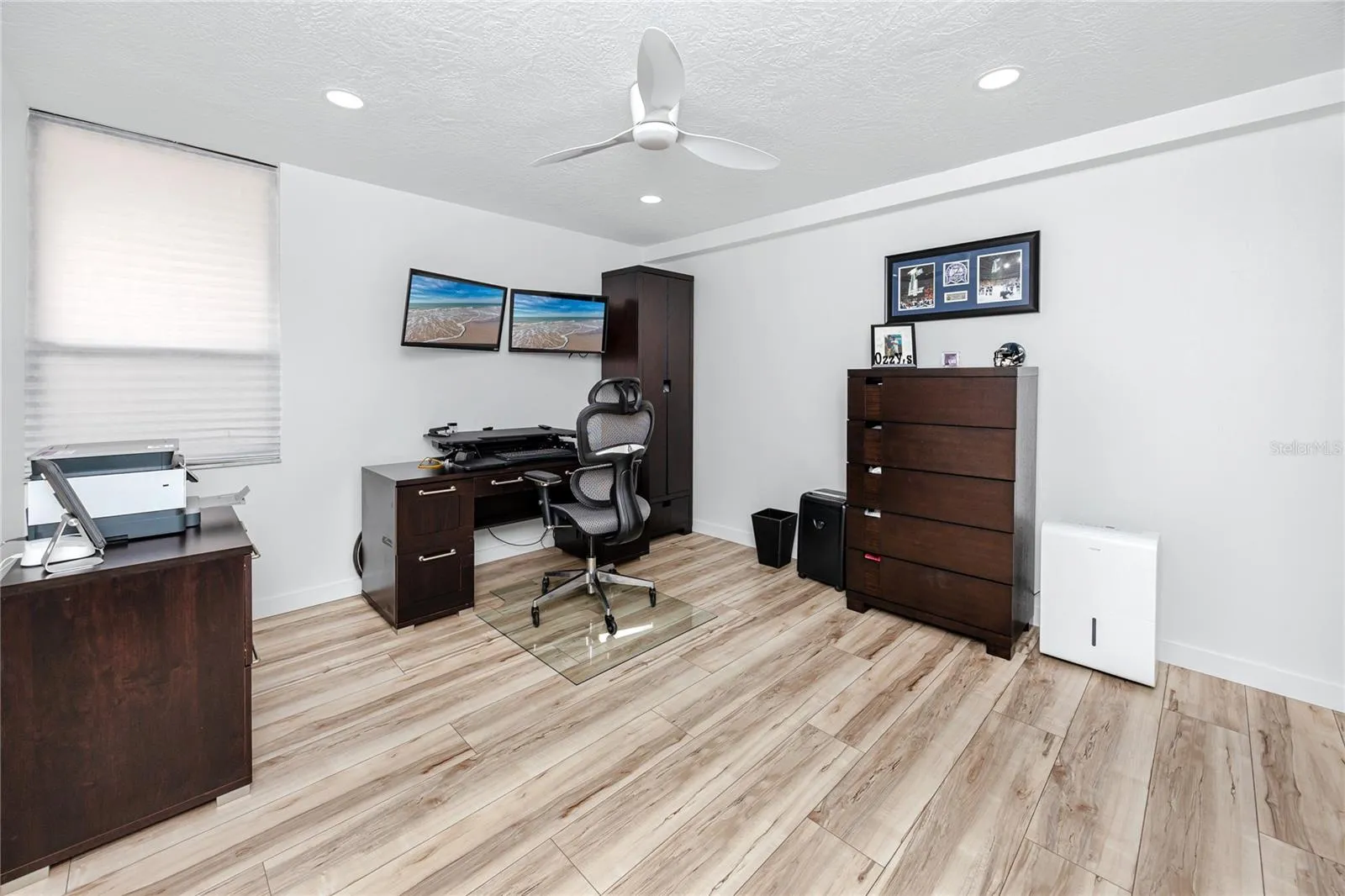 bedroom 2 (used as an office and will still fit a queen bed)