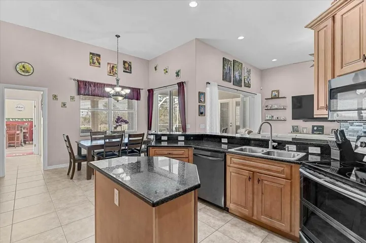 another view of Kitchen, dinning, and the game room