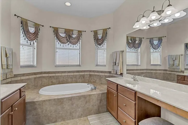 His and her vanities and garden tub