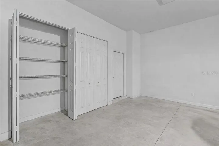 Garage showing 2 large 9 foot closets for storage