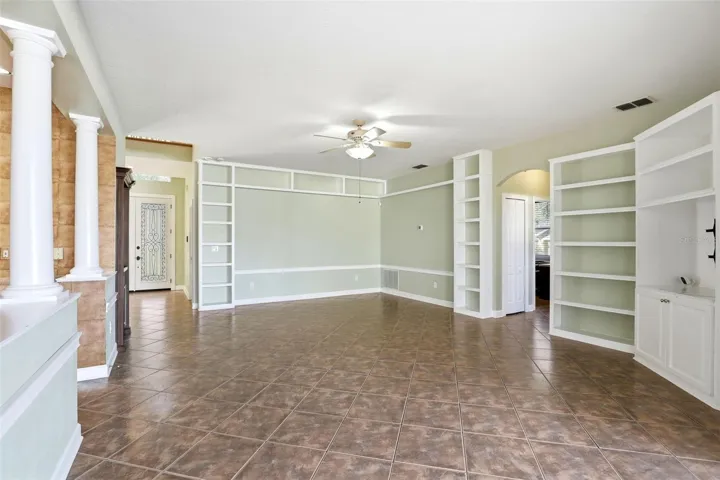 Expansive Family Room with Decorative Columns