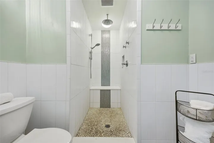 Primary bath with large updated shower