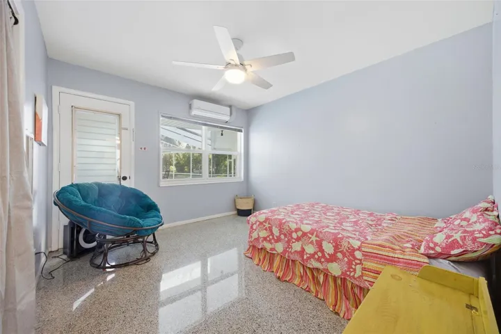 3rd bedroom, contains door to pool deck
