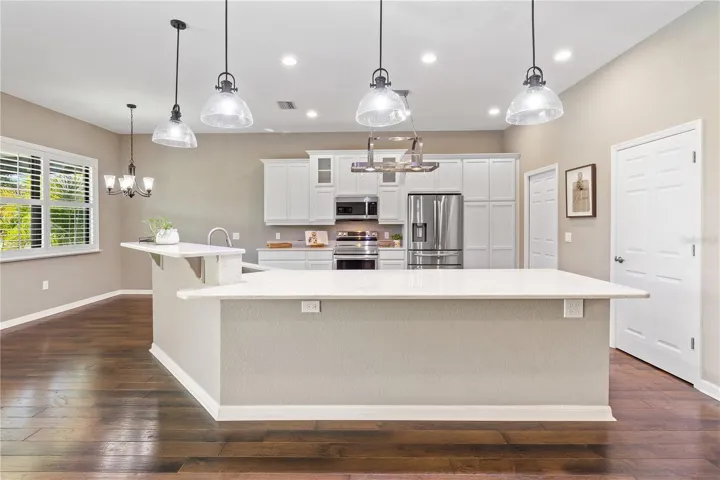 Designer lighting throughout.