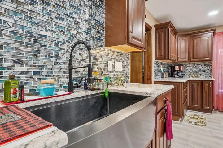 Stainless self trim sink