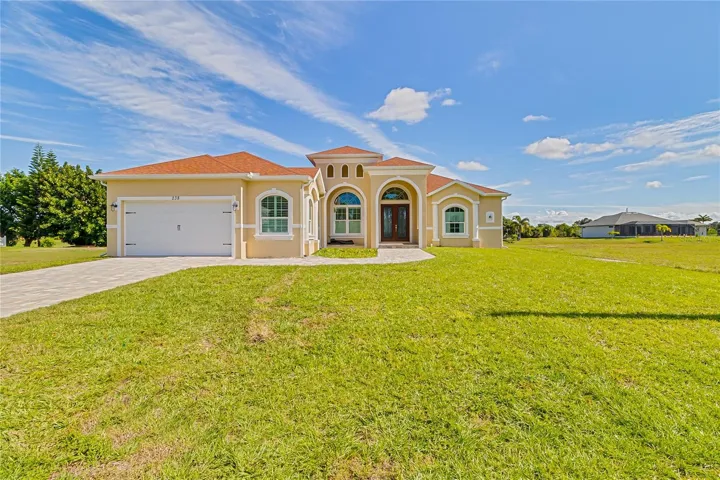 Tastefully paved driveway and front entrance
