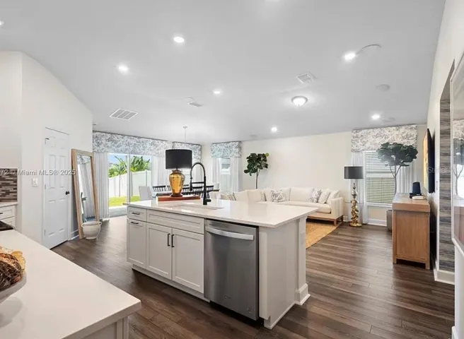 SURROUND SPEAKERS IN LIVING ROOM AREA