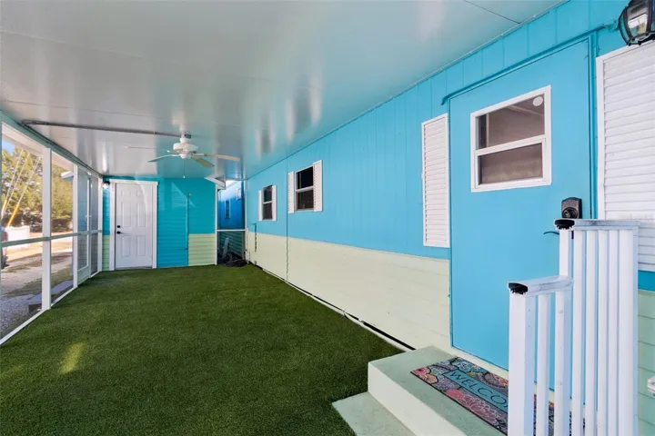 SCREENED-IN PORCH WITH FRONT DOOR AND BONUS STUDIO ACCESS DOOR
