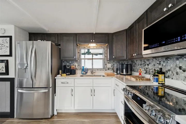 KITCHEN WITH NEW APPLIANCES &amp; STONE COUNTERTOPS