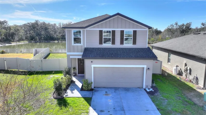 Front View of Home Located on Premium Pond Lot