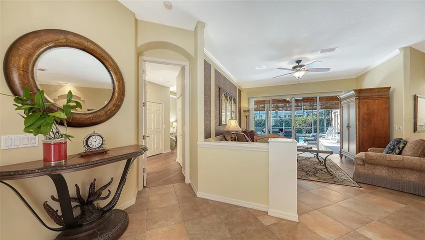 Entry into primary suite from foyer.
