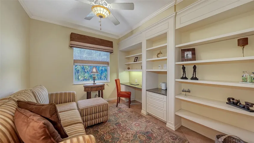 Third bedroom, very versatile, outfitted with built-ins for office or bedroom. Fits queen bed or pull out sofa.