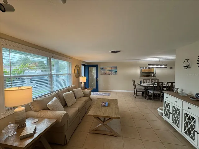 Living Room to Front Door and Dining Area
