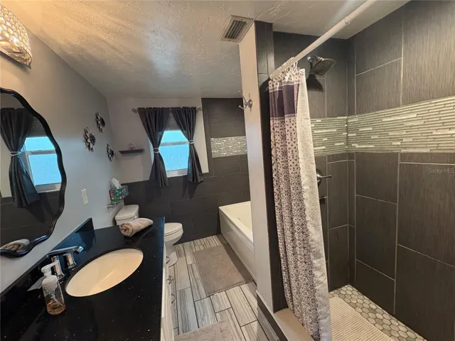 Primary Bath Tub and Walk in Shower