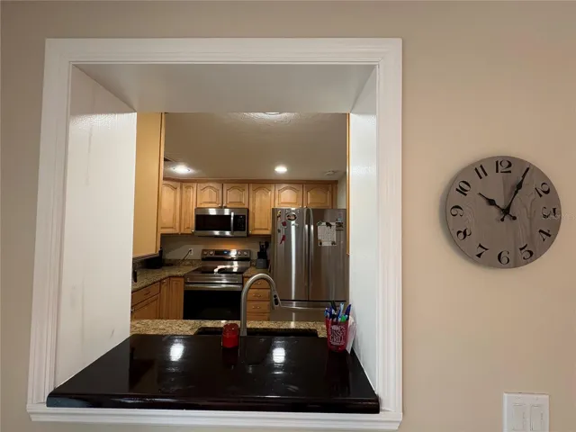 Pass thru from Kitchen to Family Room