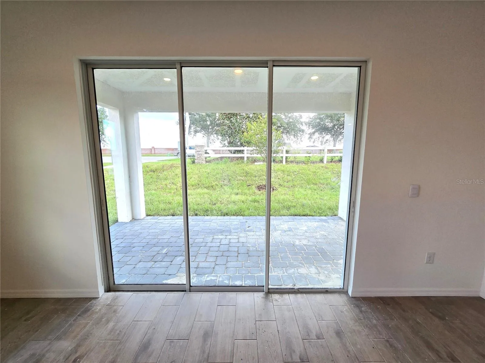Triple Slider Leads to Covered Lanai