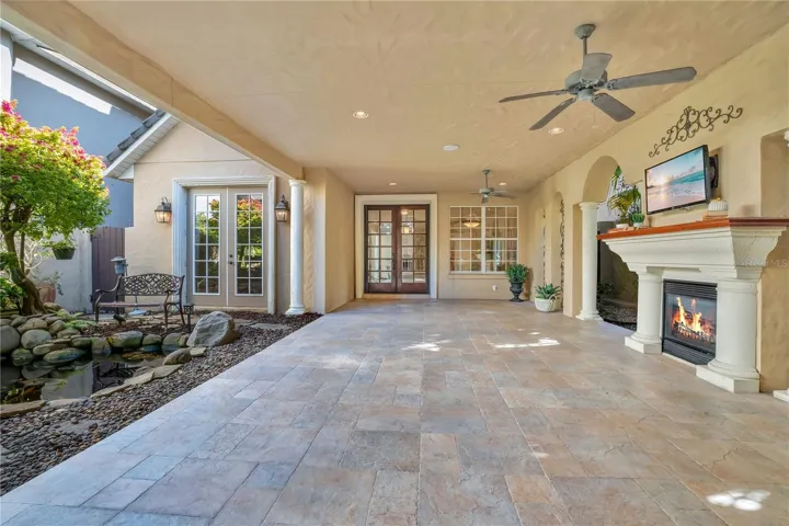 Dramatic courtyard entry with gas fireplace