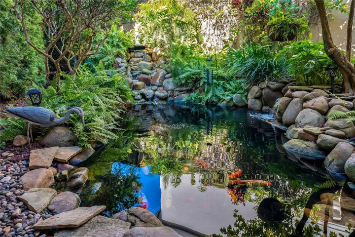 Soothing koi pond with gentle waterfall