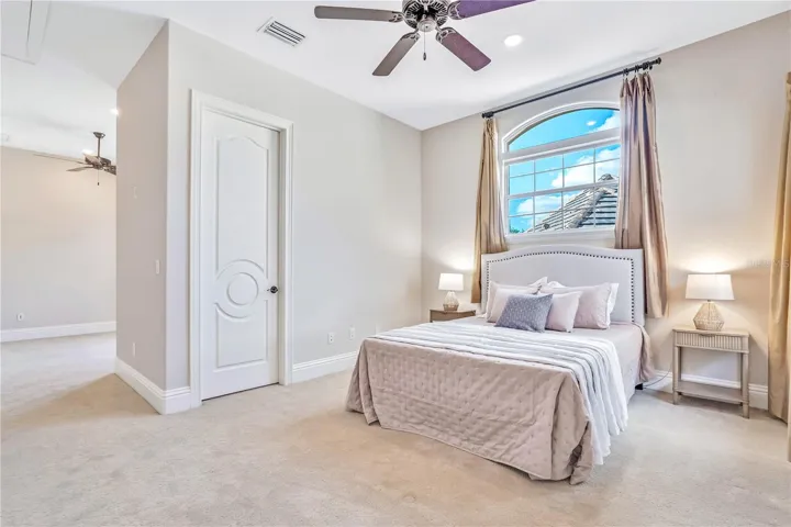 Bedroom 2 with ample storage and sitting room