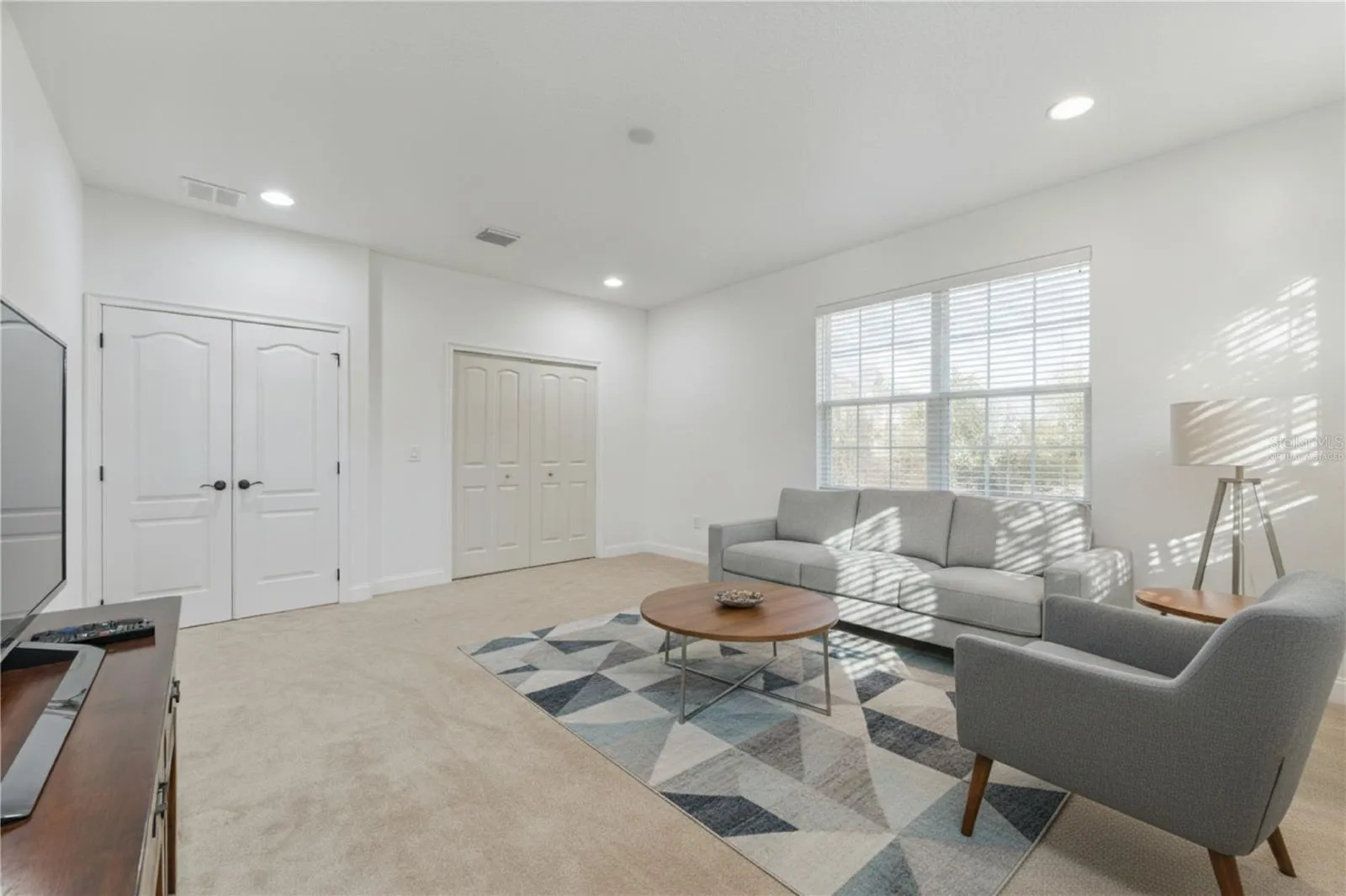 This could be a Fifth bedroom or a bonus room Virtually Staged